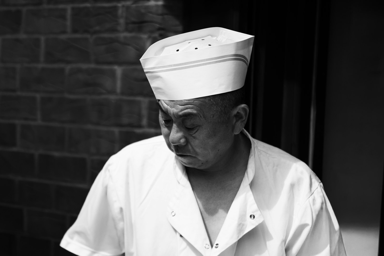 Portrait of Nora Bellamy, chef and owner of Fig & Ember, in the kitchen