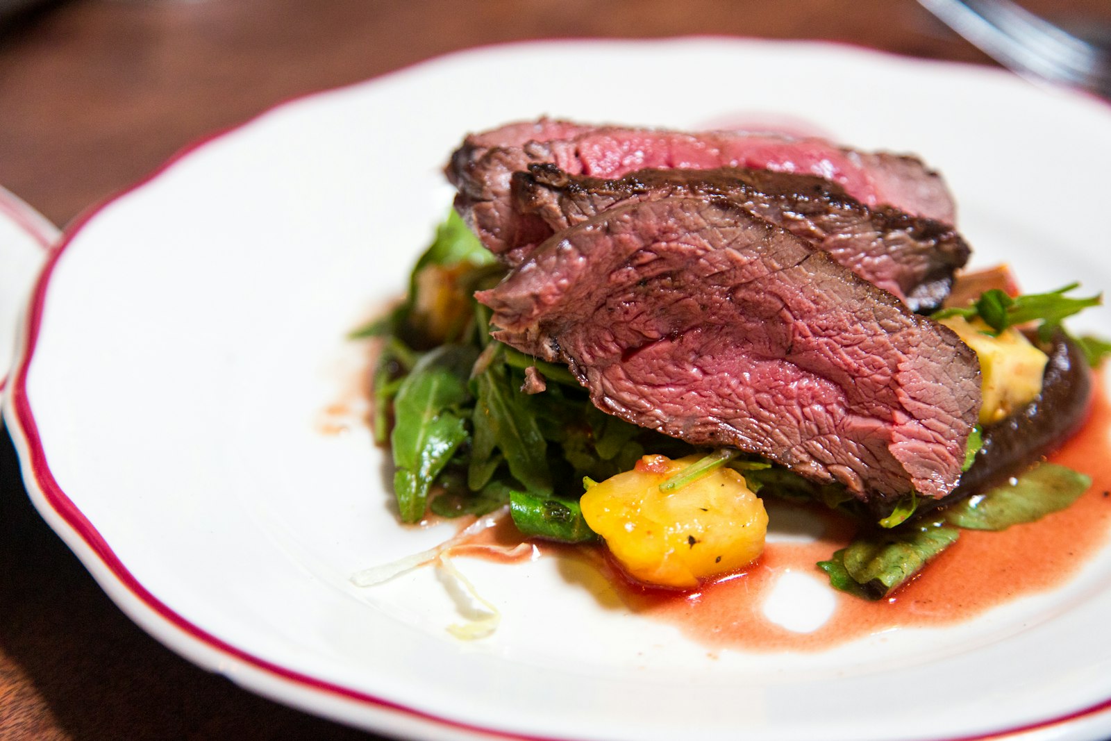 A main course dish from Fig & Ember, plated and ready to serve